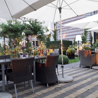 Brasserie Côté Jardin, Restaurant à Busnes